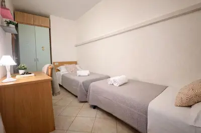 Letto o letti in una camera di Casa Prasciolu