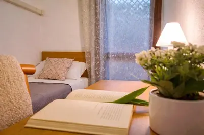 Letto o letti in una camera di Casa Prasciolu