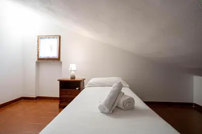 Letto o letti in una camera di Casa Terra Mia