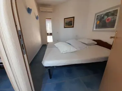 Letto o letti in una camera di Beachfront Costarei