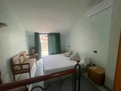 Letto o letti in una camera di Casa M & P