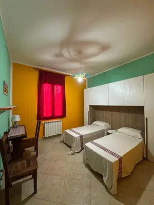 Letto o letti in una camera di La Casa del Corso
