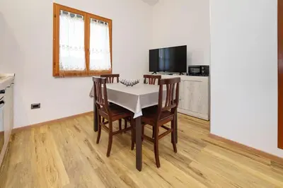 TV o dispositivi per l'intrattenimento presso Casa vacanze Sibilla appartamento Espero