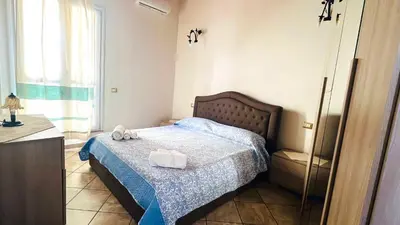 Letto o letti in una camera di The Blue Sea Apartments