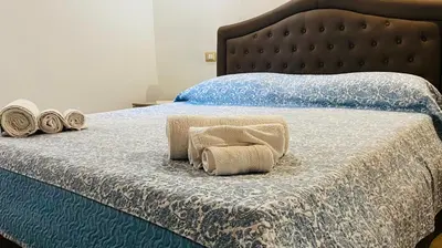 Letto o letti in una camera di The Blue Sea Apartments