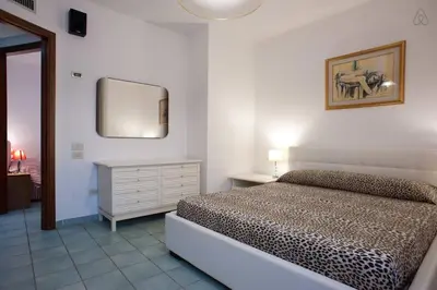 Letto o letti in una camera di Casa Vacanze Villa Flumini