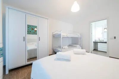 Letto o letti in una camera di Casa Dana, Wellness & Family Home SouthSardiniaHolidays