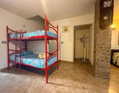 Letto o letti in una camera di L'ulivo