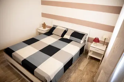 Letto o letti in una camera di Appartamento Camisa - Il Gelso