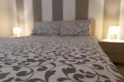 Letto o letti in una camera di Appartamento Camisa - Il Gelso
