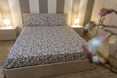 Letto o letti in una camera di Appartamento Camisa - Il Gelso
