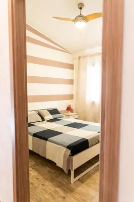 Letto o letti in una camera di Appartamento Camisa - Il Gelso