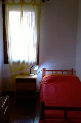 Letto o letti in una camera di Holiday Home Gemütliches Ferienhaus mit Kamin in Porto Tramat by Interhome