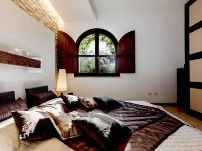 Letto o letti in una camera di Apartment Wohnung in Villasimius mit Möblierter Terrasse by Interhome