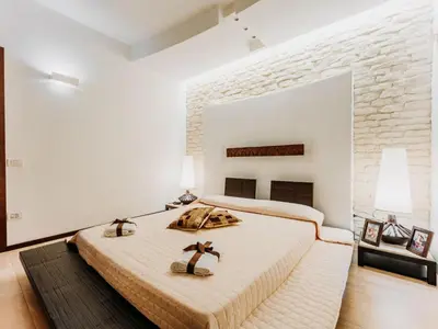 Letto o letti in una camera di Apartment Wohnung in Villasimius mit Möblierter Terrasse by Interhome