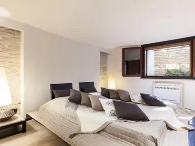 Letto o letti in una camera di Apartment Wohnung in Villasimius mit Möblierter Terrasse by Interhome