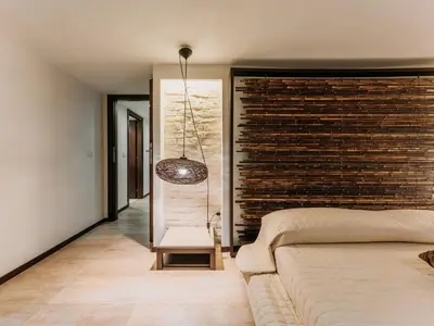 Letto o letti in una camera di Apartment Wohnung in Villasimius mit Möblierter Terrasse by Interhome