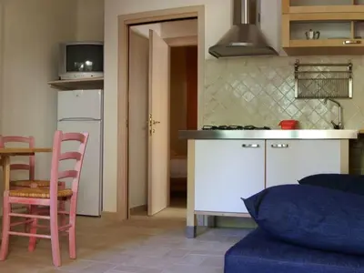 Cucina o angolo cottura di Apartment Zwei-Zimmer-Wohnung in Santa Margherita di Pula by Interhome