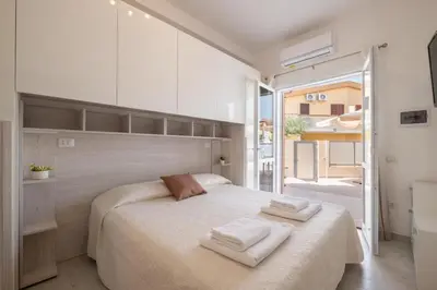 Letto o letti in una camera di L'ulivo di Villasimius