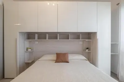 Letto o letti in una camera di L'ulivo di Villasimius