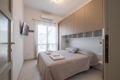 Letto o letti in una camera di L'ulivo di Villasimius