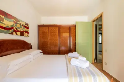 Letto o letti in una camera di Sa Marina Holiday House - al mare con giardino