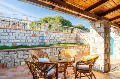 Balcone o terrazza di Sa Marina Holiday House - al mare con giardino