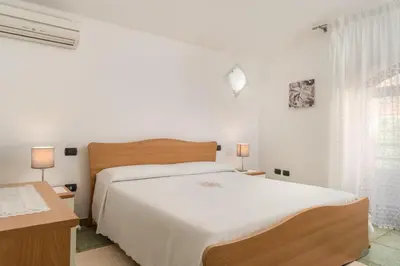 Letto o letti in una camera di Casa Sofia