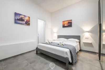 Letto o letti in una camera di Appartamento Antica Parruccheria