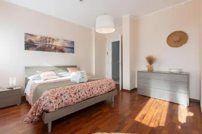 Letto o letti in una camera di GuestHost - Relax & Fun Home between sea & city