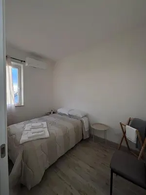 Letto o letti in una camera di Appartamentino Sadalese