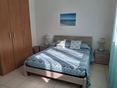 Letto o letti in una camera di Casa Remì