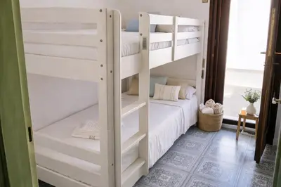 Letto o letti in una camera di BlueMind