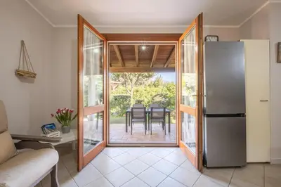 Cucina o angolo cottura di Villa in Residence a 5 minuti dal mare e centro paese- Privacy e relax