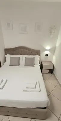 Letto o letti in una camera di Domus Fra