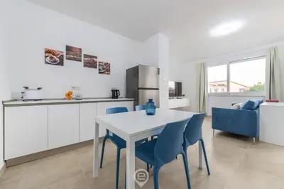 Cucina o angolo cottura di Coru e Mari Appartamenti - Baia
