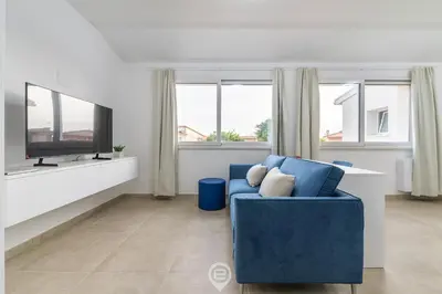 TV o dispositivi per l'intrattenimento presso Coru e Mari Appartamenti - Baia
