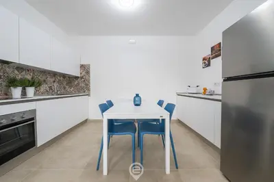 Cucina o angolo cottura di Coru e Mari Appartamenti - Baia