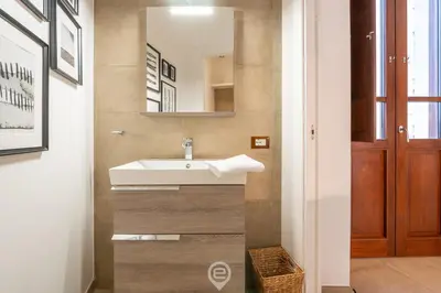 Letto o letti in una camera di Angioy 54 Loft, Cosy flat in central Cagliari