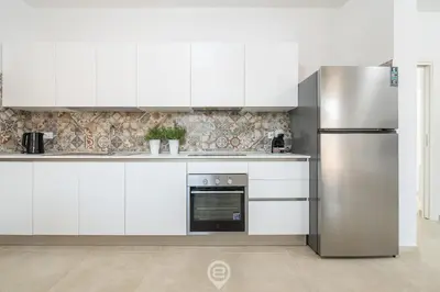 Cucina o angolo cottura di Coru e Mari Appartamenti - Laguna