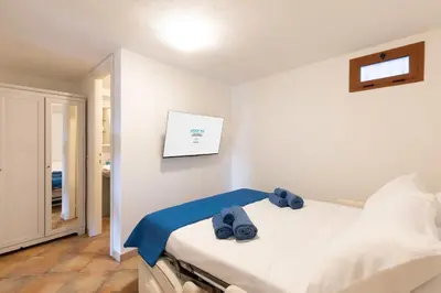 Letto o letti in una camera di Casa Cecilia - Free Wifi