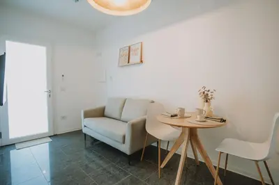 Area soggiorno di Gaiè Apartments