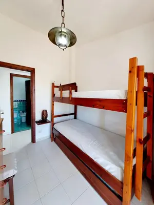 Letto o letti in una camera di Villa Belvedere