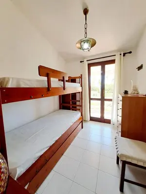 Letto o letti in una camera di Villa Belvedere