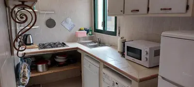 Cucina o angolo cottura di Pili Estate Dependanc - Casa Vacanze