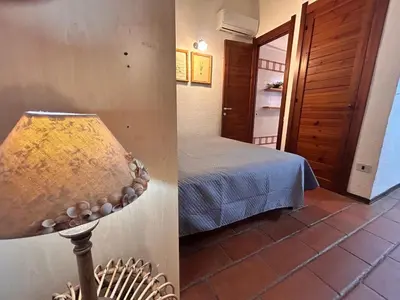 Letto o letti in una camera di Villa Vittorio