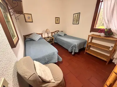 Letto o letti in una camera di Villa Vittorio