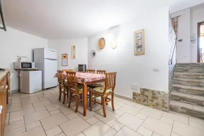 Cucina o angolo cottura di EcoLux Pool Villa, Easy Access SouthSardiniaHolidays