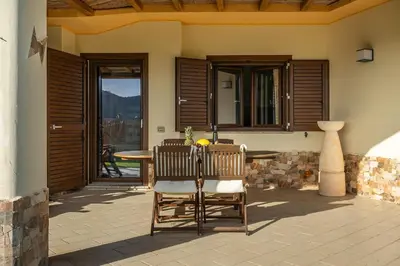 Area soggiorno di EcoLux Pool Villa, Easy Access SouthSardiniaHolidays