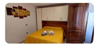 Letto o letti in una camera di Dreaming Porto Frailis
